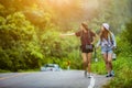 The tourist asian women travel in the middle of nature the car was stopped