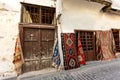 Tourist attraction. Street in old city with carpet shops. Royalty Free Stock Photo