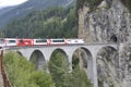 Tourist attraction: Crossing the swiss alps in the Glacier Express train. DIe Touristenattraktion: Alpentransversale im Glacier E