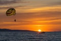 Parasailing at sunset, the Adriatic sea, Dalmatia, Makarska, Croatia Royalty Free Stock Photo