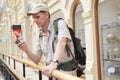 Tourist with backpack in the passage Royalty Free Stock Photo