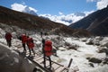 Tourist backpacker on the way on Everest base camp trekking in Sagarmatha national park heading to everest moutain Royalty Free Stock Photo