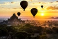 Tourist Balloons and Pagoda at Sunrise, Bagan, Myanmar