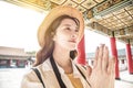 Tourist beautiful asian young woman praying at chinese temple Royalty Free Stock Photo