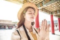 Tourist beautiful asian young woman praying at chinese temple Royalty Free Stock Photo