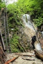 A tourist in the beautiful gorges of the Slovak Paradise National Park Royalty Free Stock Photo