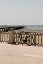 Tourist bike in front of sea beach in city center andernos France