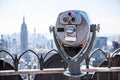 Tourist binoculars at top of building with Manhattan skyline view. New York Royalty Free Stock Photo