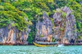 The tourist boat against the James Bond Island, Phang Nga, Thailand Royalty Free Stock Photo