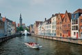 Tourist boat in canal. Brugge Bruges, Belgium Royalty Free Stock Photo