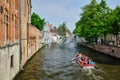 Tourist boat in canal. Brugge Bruges, Belgium Royalty Free Stock Photo