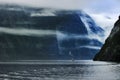 Tourist boat cruising in milford sound fjordland national park southland new zealand