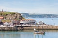 A Tourist Boat Departs Whitby, Yorkshire Royalty Free Stock Photo