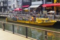 tourist boat on Dotonbori canal in Dotonbori district, Osaka, Japan