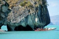 Tourist boat on excursion at Marble Caves, Capillas de Marmol island in Chile Royalty Free Stock Photo