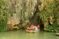 Tourist boat exiting cave in Cuba