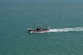 A tourist boat ferrying passengers at sea