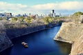 A tourist boat is floating on the moat of Japan Osaka Castle Park, winter Royalty Free Stock Photo