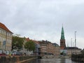 Tourist boat on Gammel Strand canal. Nikolaj Kirke Church and Thorvaldsens museum on the background at Copenhagen