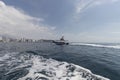 Tourist boat offshore going to Rodadero beach at background