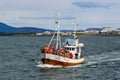 Tourist boat returning from Puffin Watching Tour in Reykjavik harbor