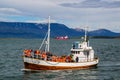 Tourist boat returning from Puffin Watching Tour in Reykjavik harbor