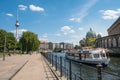 Tourist boat on river Spree at Monbijoupark with Berlin Cathed Royalty Free Stock Photo