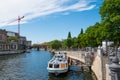 Tourist boat on river spree at Monbijoupark in Berlin Mitte on a Royalty Free Stock Photo