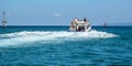 A tourist boat running on the sea in Bali, Indonesia