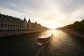 Tourist boat tour on Seine river with beautiful sunset in Paris