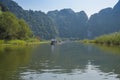 boat trip for tourists in the incredible site of tam coc,Ninh Binh, Vietnam Royalty Free Stock Photo