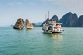 Tourist Boat Visiting the Kissing Rocks in Halong Bay, Vietnam Royalty Free Stock Photo