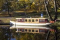 tourist boats Autumn park in the center of Riga, Latvia Canal that flows through Bastion park autumn