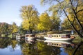 tourist boats Autumn park in the center of Riga, Latvia Canal that flows through Bastion park autumn