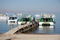 Tourist boats at the berth on Titicaca lake Royalty Free Stock Photo