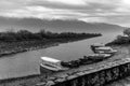 Tourist boats for bird-watching docked in row waiting at the shore of Kerkini lake in Greece