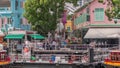 Tourist boats docking at Clarke Quay habour timelapse. Royalty Free Stock Photo