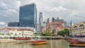 Tourist boats docking at Clarke Quay habour timelapse hyperlapse. Royalty Free Stock Photo