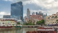 Tourist boats docking at Clarke Quay habour timelapse hyperlapse. Royalty Free Stock Photo