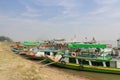 Tourist boats docking in front of the Mingun temple on the Irrawaddy river Royalty Free Stock Photo