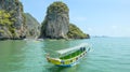 Tourist boats in front of James Bond Island in Phang Nga Bay, Thailand Royalty Free Stock Photo