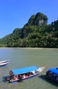 Tourist boats, Island of the Pregnant Maiden lake Royalty Free Stock Photo