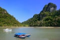 Tourist boats, Island of the Pregnant Maiden lake Royalty Free Stock Photo