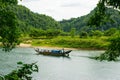 Tourist boats, the mouth of Phong Nha cave with underground river, Phong Nha-Ke Bang National Park, Vietnam