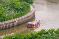 Tourist boats moving on the Nhieu Loc canal