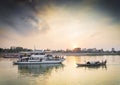 Tourist boats on sunset cruise in phnom penh cambodia river