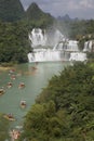 Tourist boats viewing Detian Waterfalls in Guangxi Province, Chi