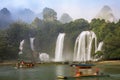 Tourist boats viewing Detian Waterfalls in Guangxi Province, Chi