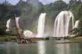 Tourist boats viewing Detian Waterfalls in Guangxi Province, Chi