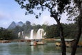 Tourist boats viewing Detian Waterfalls in Guangxi Province, Chi